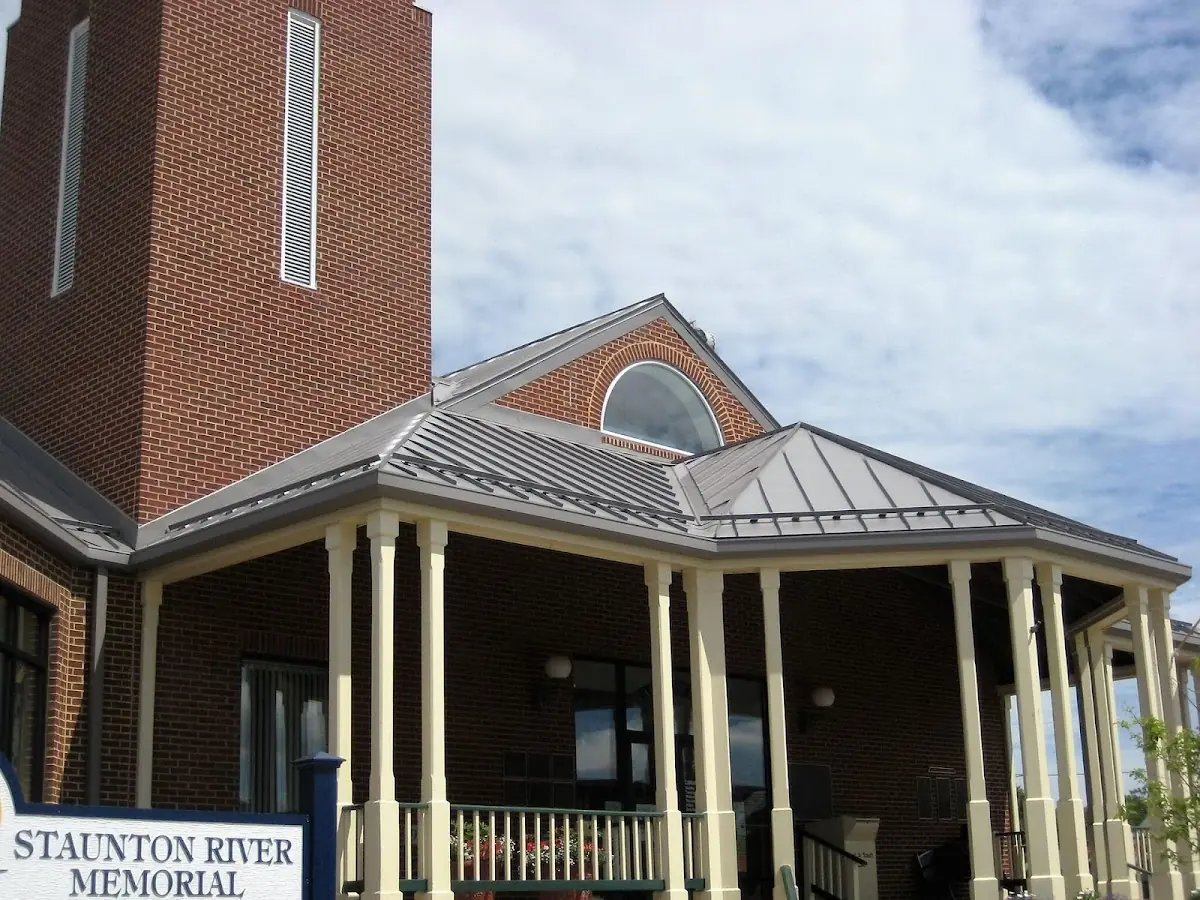 Skilled roofing craftsmen working on a residential roof in Roytown